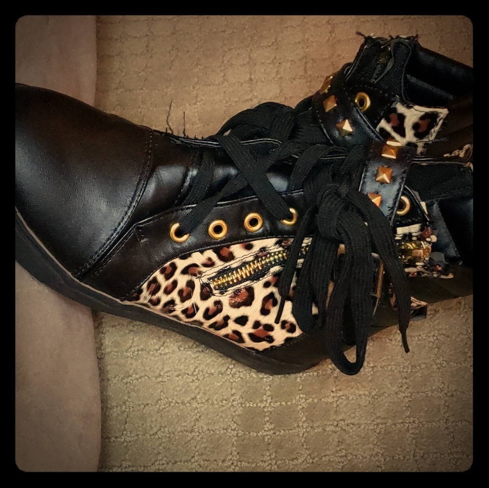 Black with cheetah print high top shoes